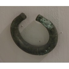 Metallic artifact, cuff bracelet